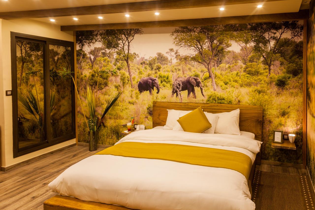 Le Wafou Hotel Abidjan Bagian luar foto